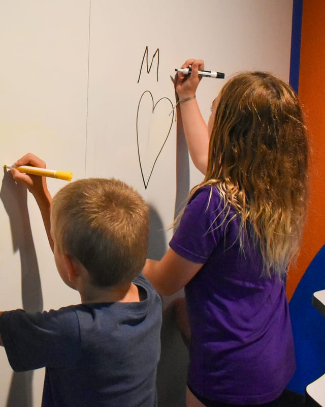 Kids doing homework and playing in the after school program in Willis, TX